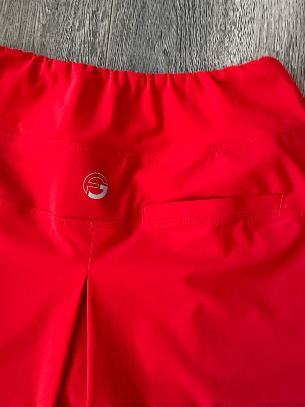 Women’s Red Skater Skirt with Subtle Logo - Picture 13 of 14